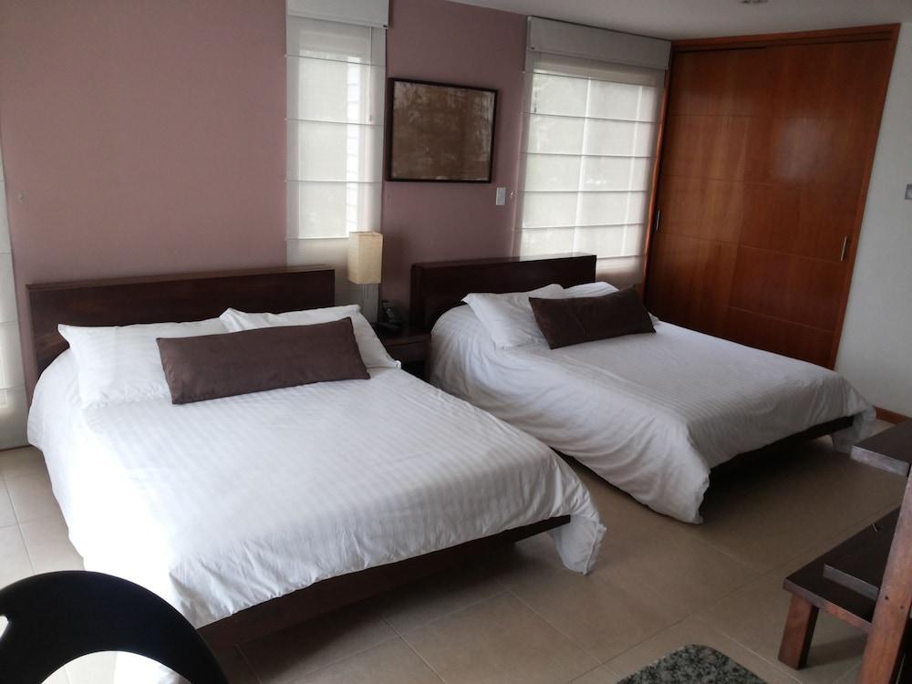 Cyan Suites Poblado By Mde Bnb Medellín Extérieur photo